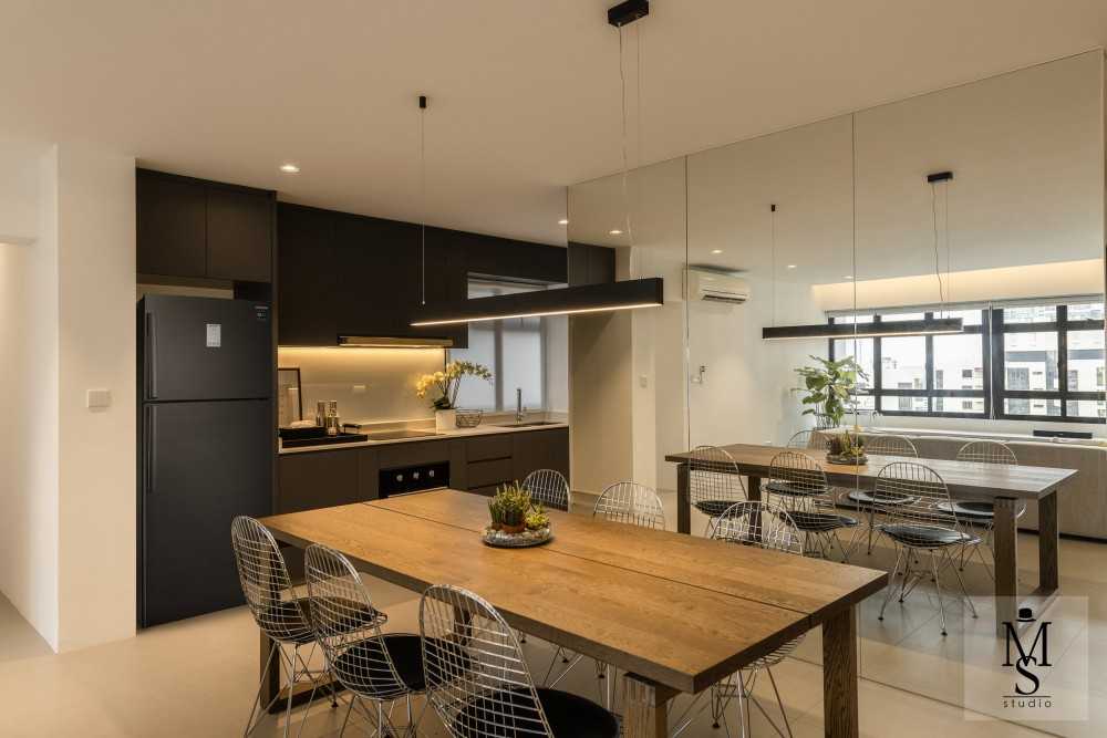 Minimalist Dining Room with Chandelier and Dining Table