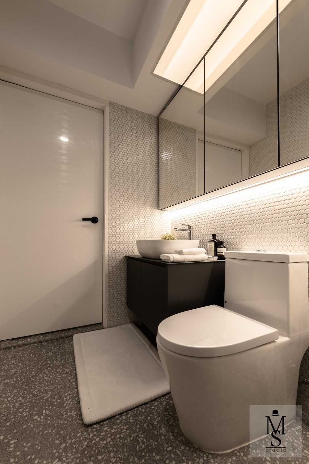 Minimalist Bathroom with Countertop and Mirror