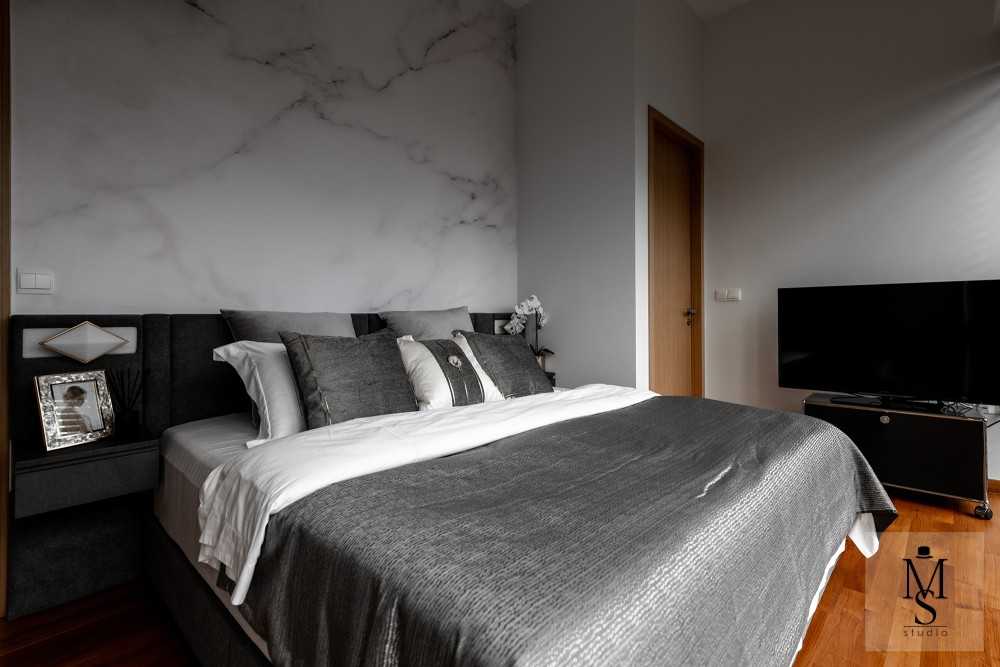 Contemporary Bedroom with Parquet Floor and Bedside Table