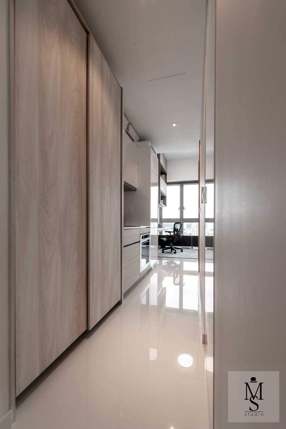 Contemporary Entryway with Stools and Shoe Cabinets