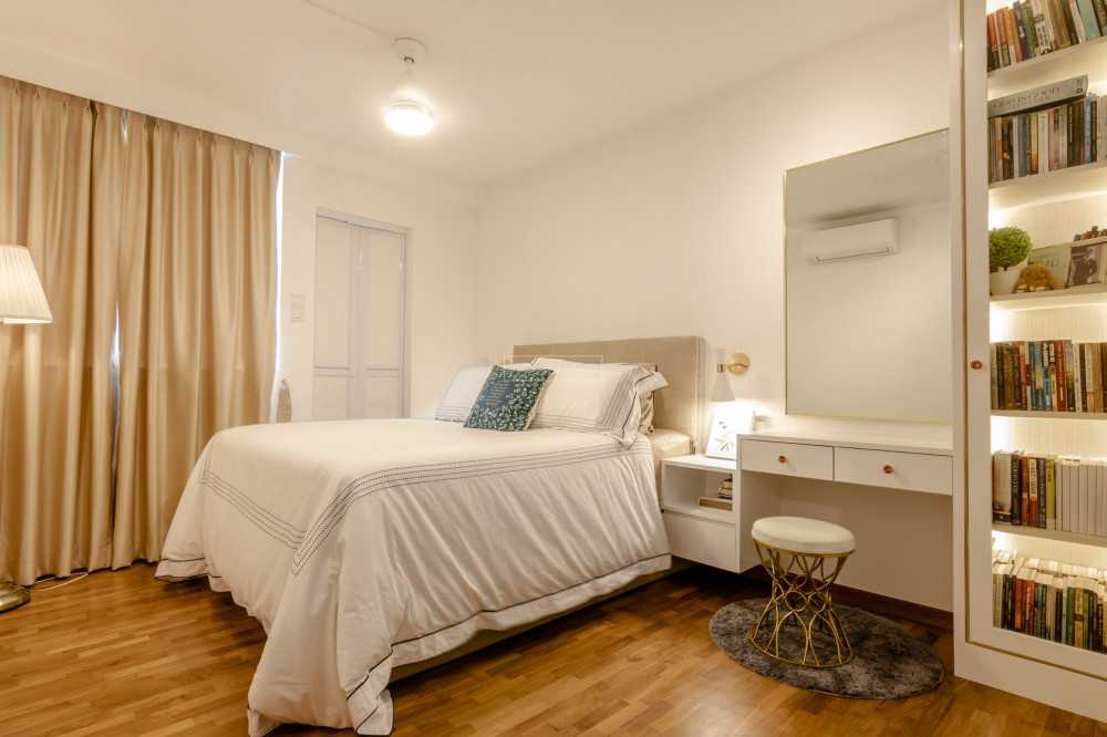 Contemporary Bedroom with Bookshelf and Parquet Floor