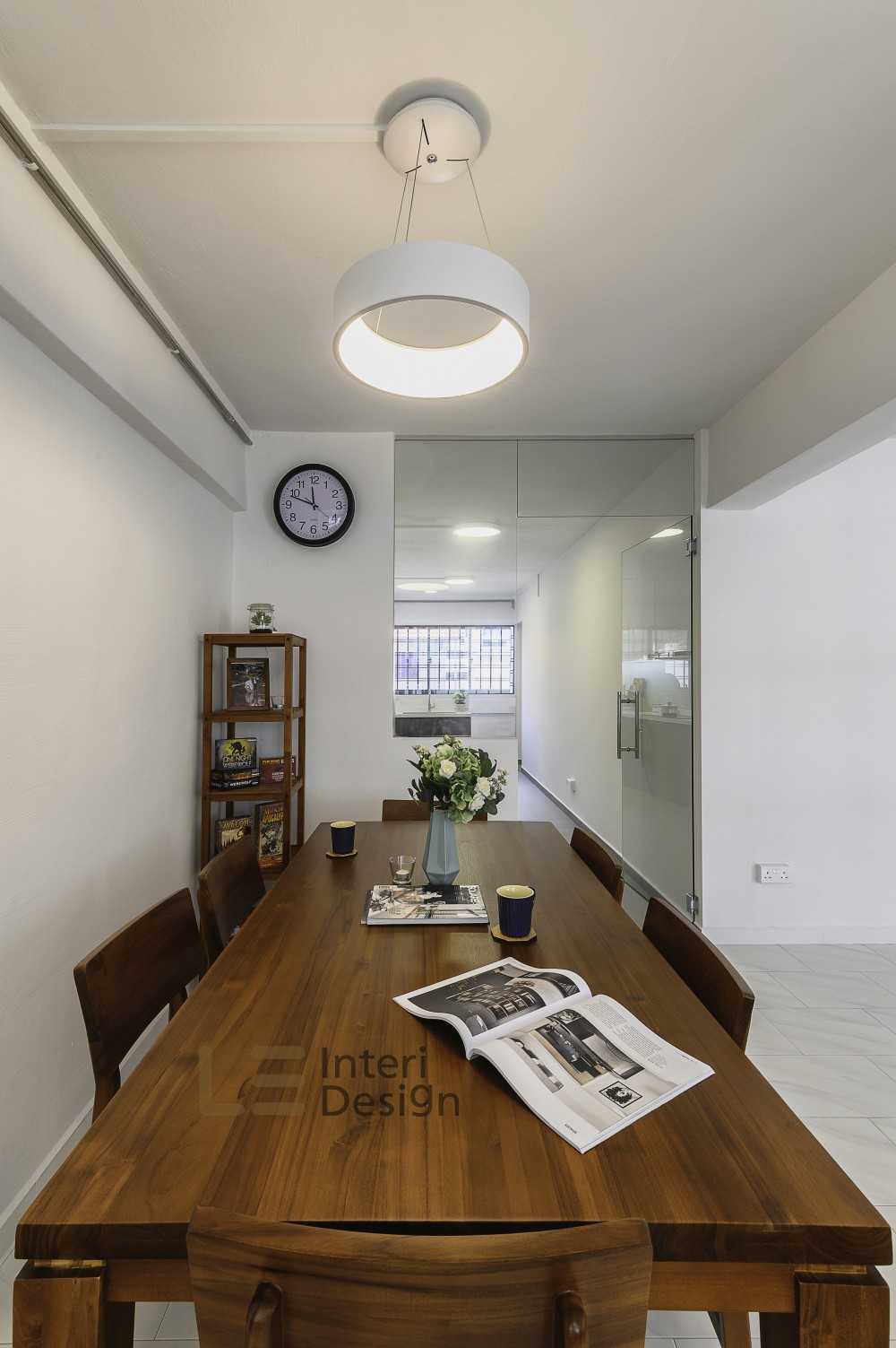 Scandinavian Dining Room with Glass Door and Dining Table