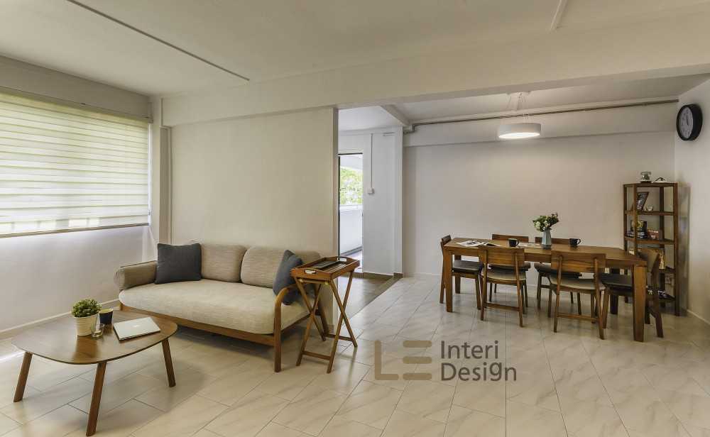 Scandinavian Living Room with Homogeneous Tiles and Sofa