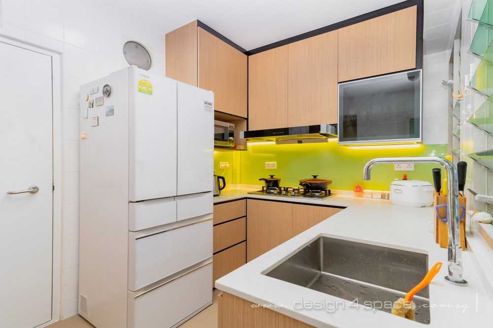 Modern Kitchen with Herringbone Tiling and Wood Flooring