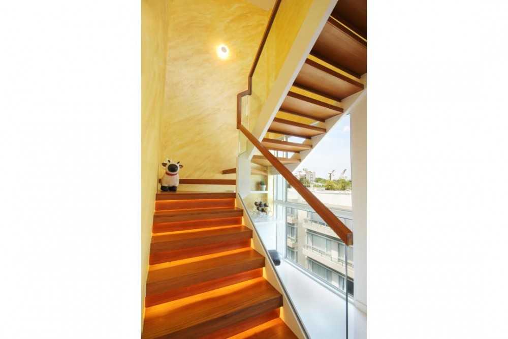 Modern Hallway with Feature Wall and Staircase