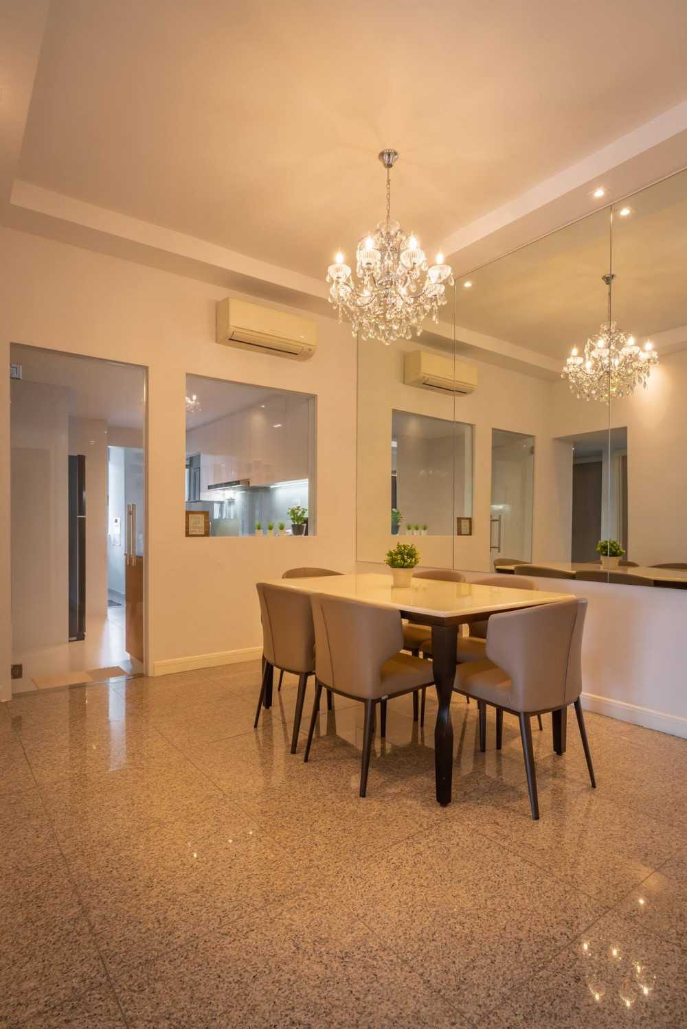 Minimalist Dining Room with Drop Light and Chandelier