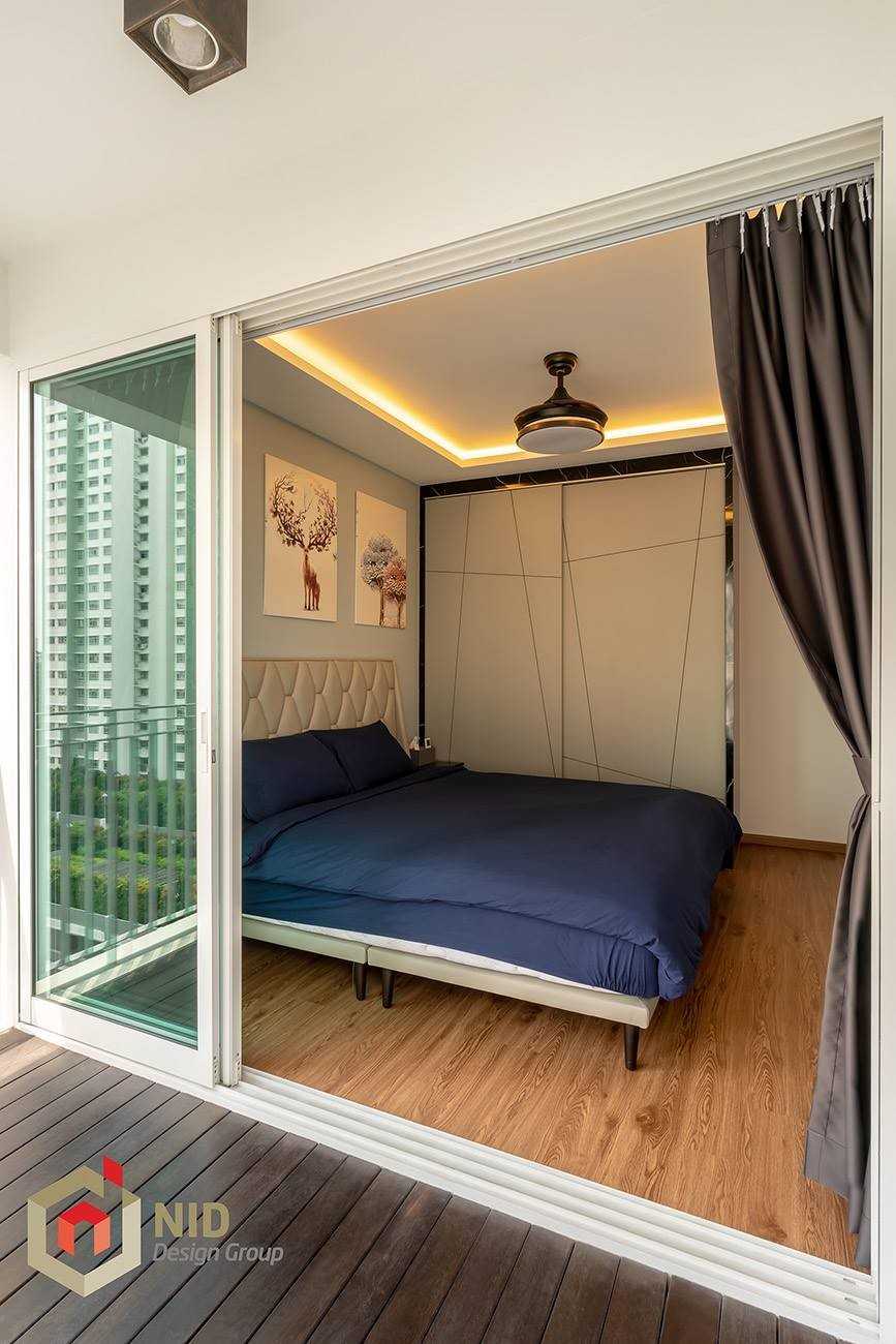 Minimalist Bedroom with Drop Light and Wardrobe