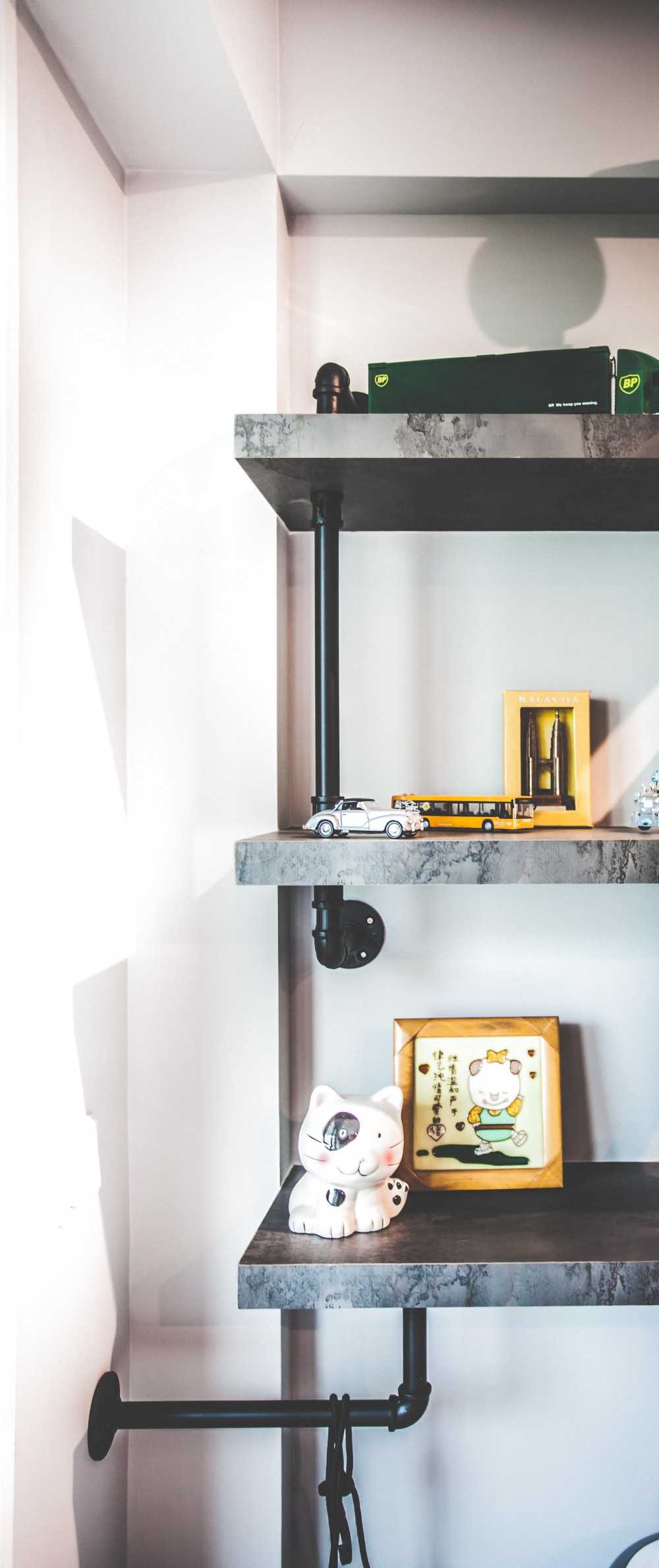 Industrial Living Room with Bookshelf and Feature Wall