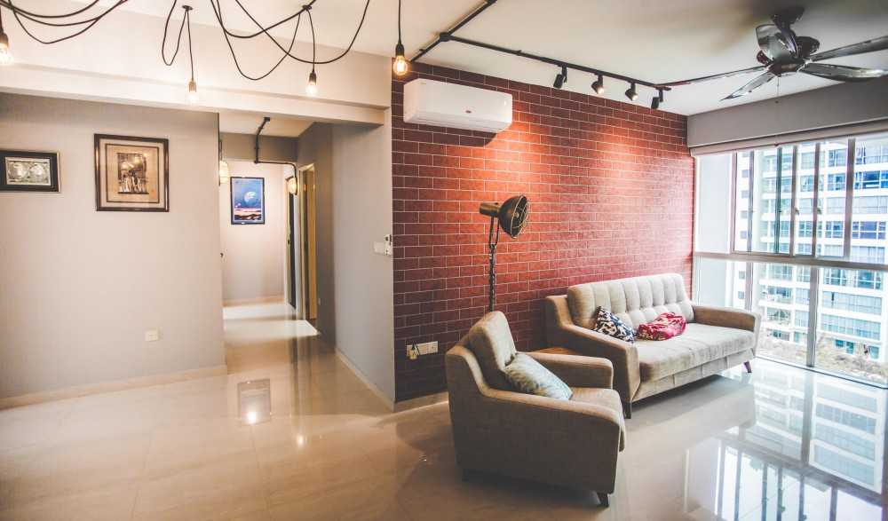 Industrial Living Room with Feature Wall and Paintings
