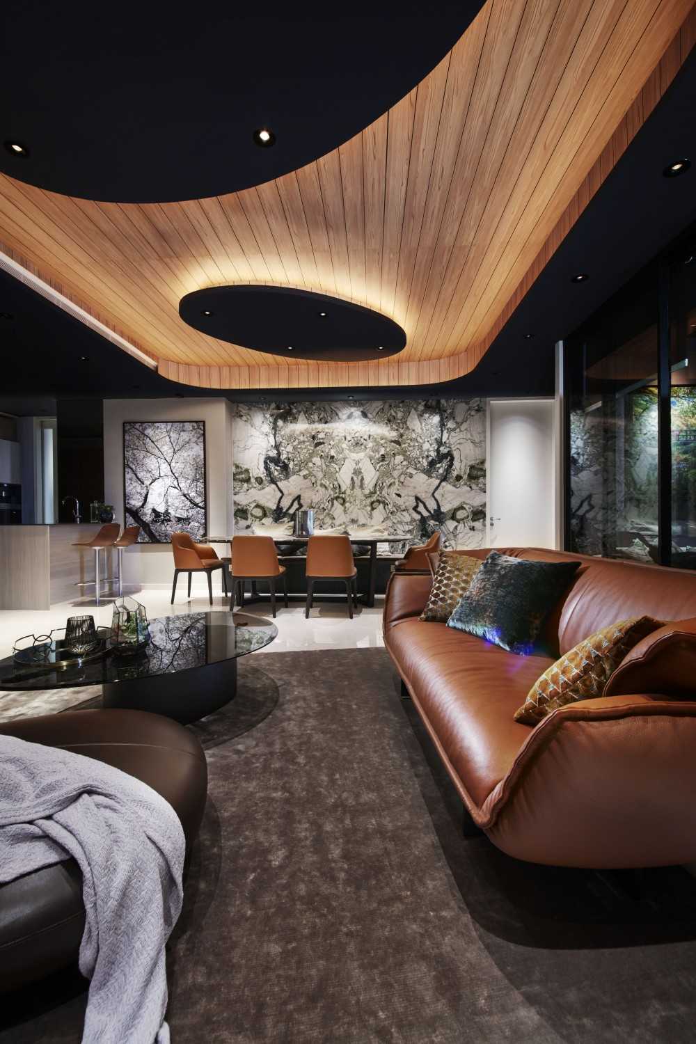 Contemporary Living Room with Cove Lighting and Sofa