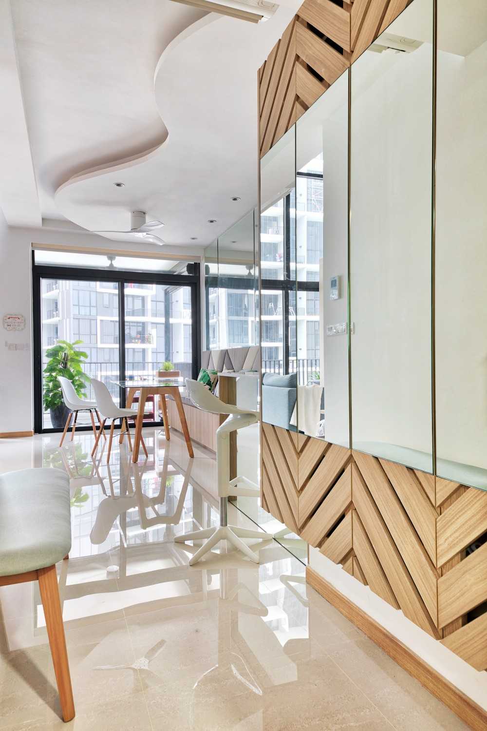 Scandinavian Hallway with Marble Floor and Mirror