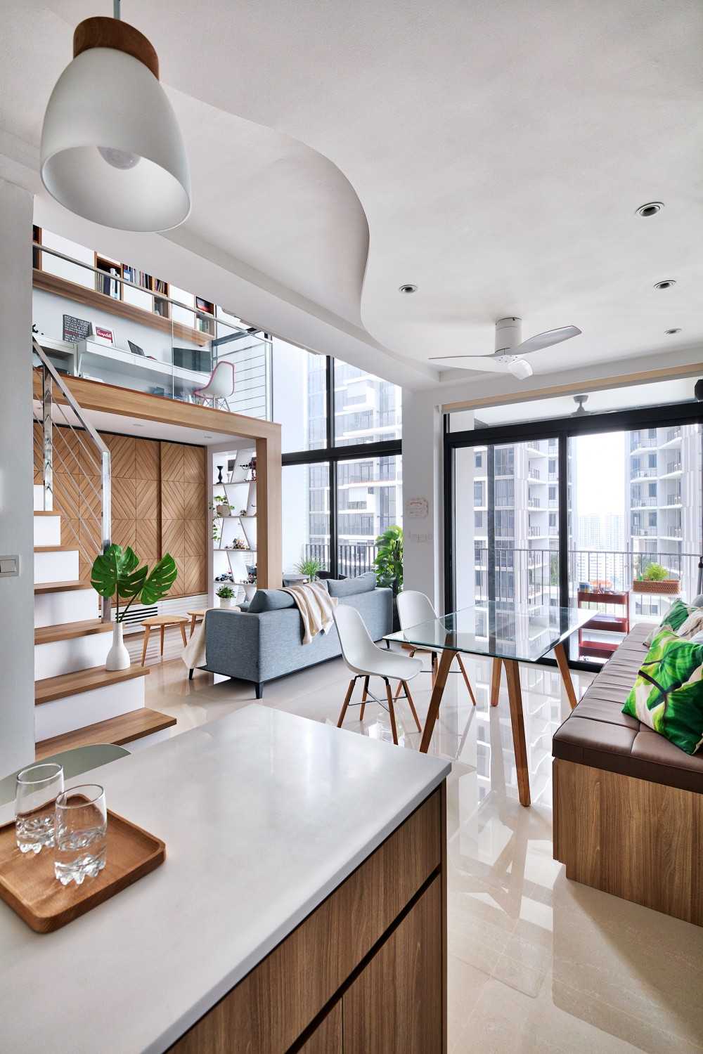 Scandinavian Dining Room with Kitchen Island and Dining Table
