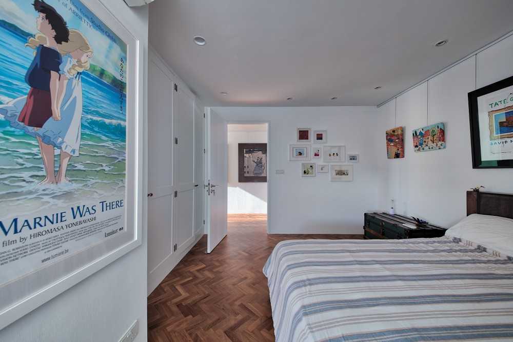Contemporary Bedroom with Wardrobe and Paintings