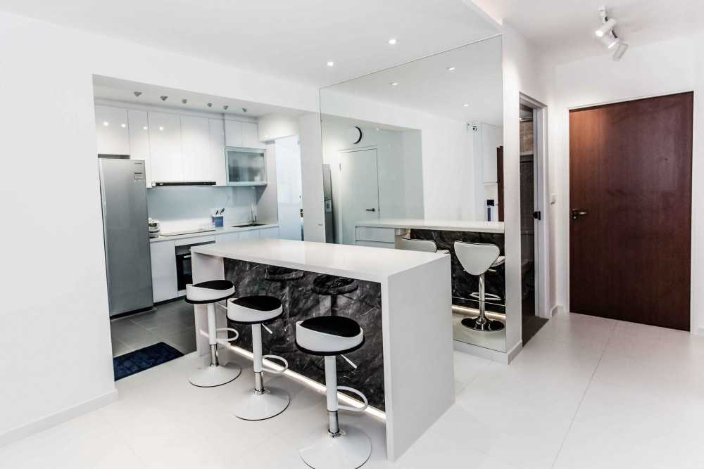 Modern Dining Room with Drop Light and Mirror