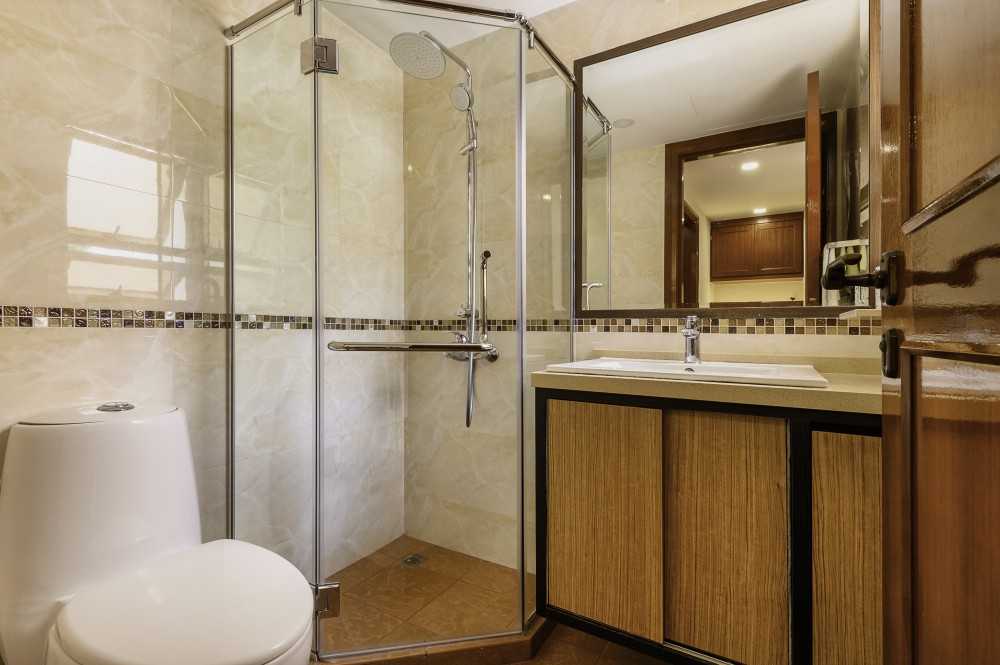Asian Bathroom with Homogeneous Tiles and Feature Wall