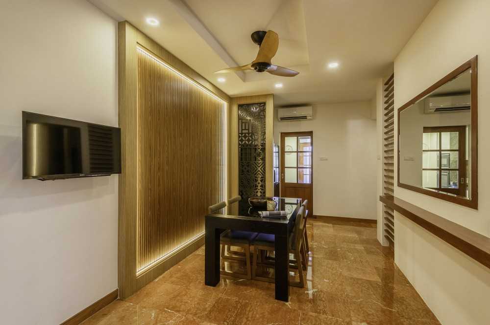 Asian Dining Room with Feature Wall and Drop Ceiling