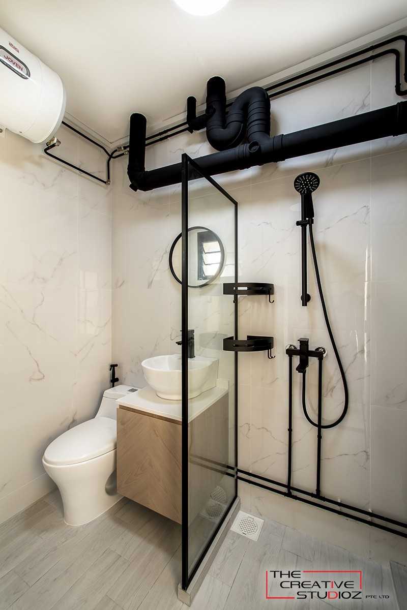 Minimalist Bathroom with Homogeneous Tiles and Shower Screen