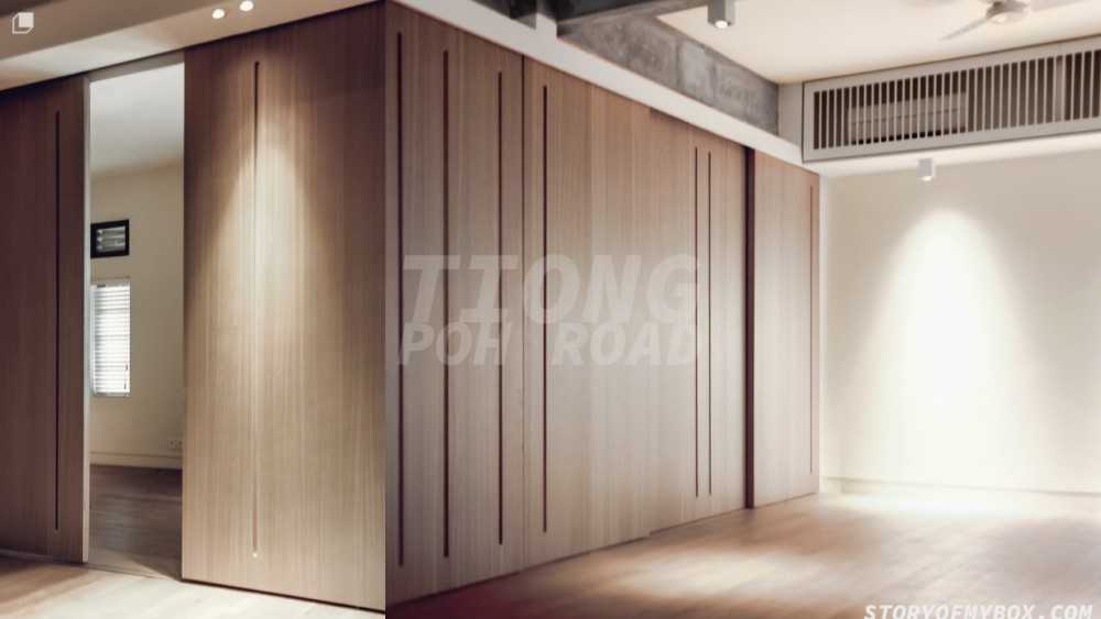 Minimalist Living Room with Wood Flooring and Feature Wall