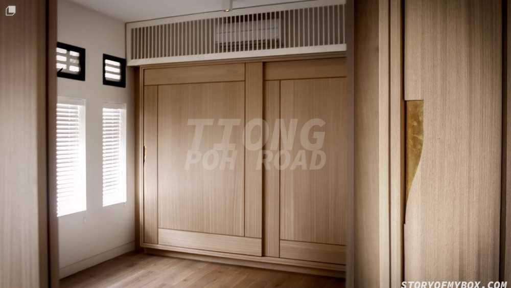 Minimalist Bedroom with Wood Flooring and Wardrobe