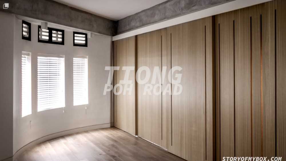 Minimalist Living Room with Wood Flooring and Feature Wall