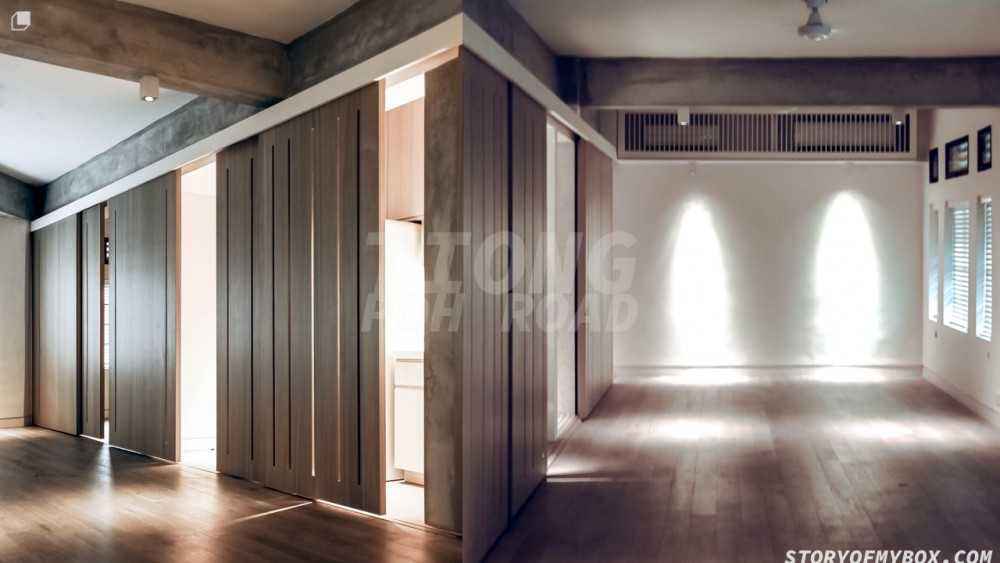 Minimalist Living Room with Wood Flooring and Feature Wall