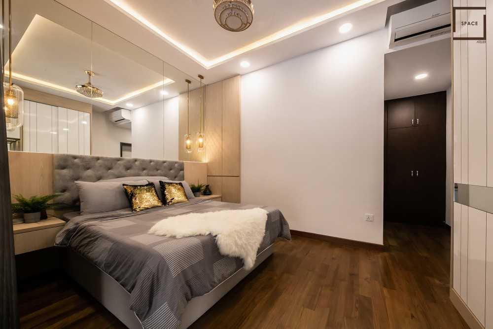 Modern Bedroom with Parquet Floor and Cove Lighting