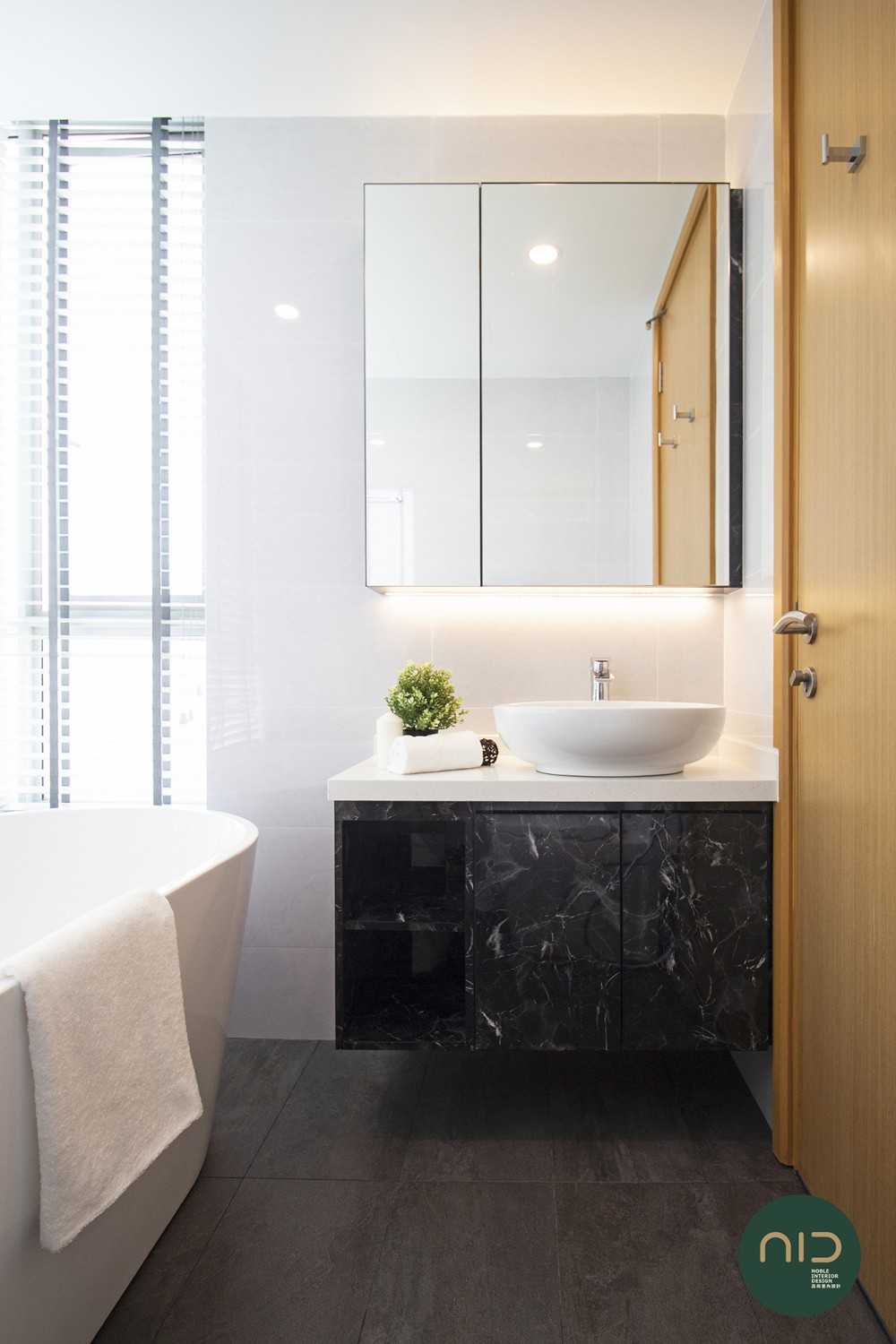Modern Bathroom with Homogeneous Tiles and Mirror