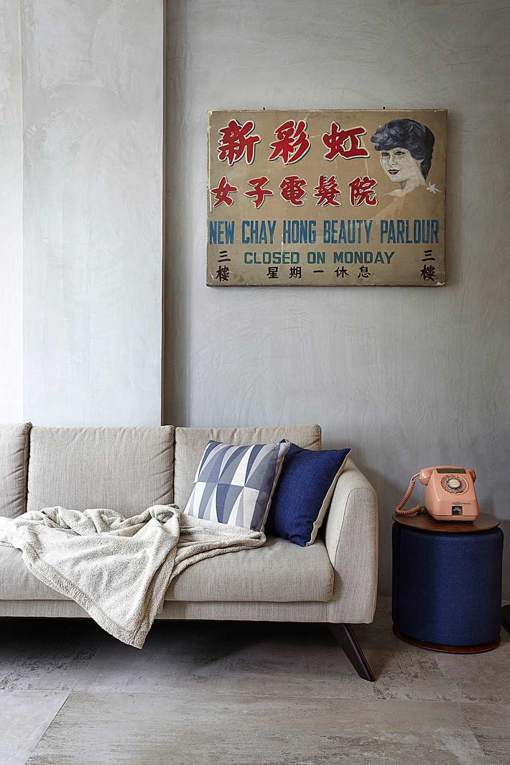 Vintage Living Room with Cement Floor and Sofa