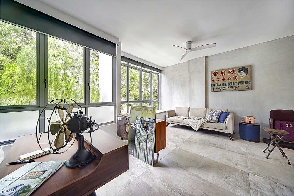 Vintage Living Room with Cement Floor and Sofa