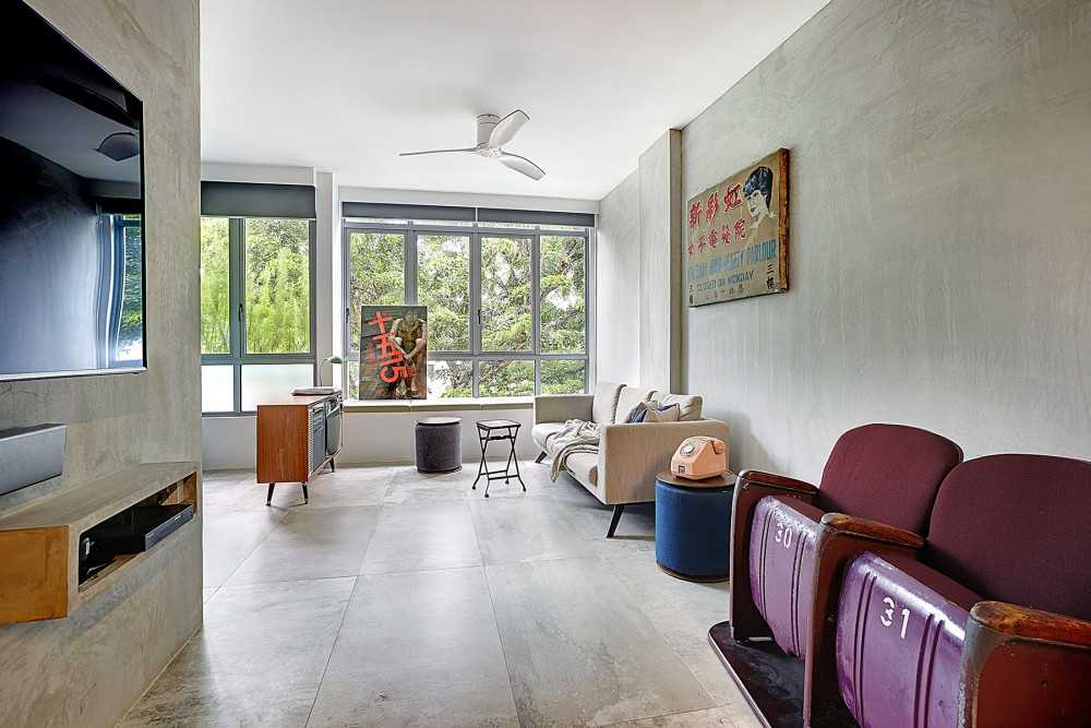Vintage Living Room with Cement Floor and TV Console