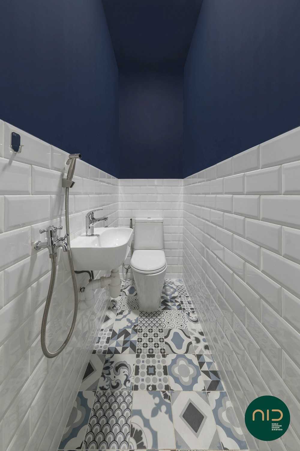 Modern Bathroom with Homogeneous Tiles and Paintings