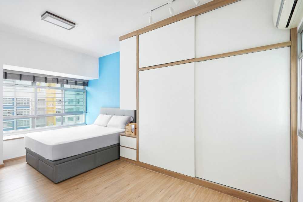 Minimalist Bedroom with Wardrobe and Queen Bed