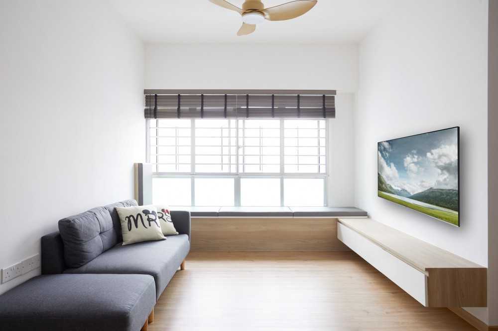 Minimalist Living Room with TV Console and Ceiling Light