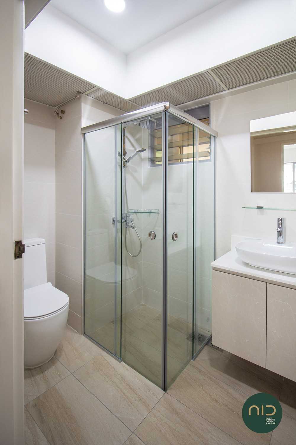 Modern Bathroom with Homogeneous Tiles and Mirror