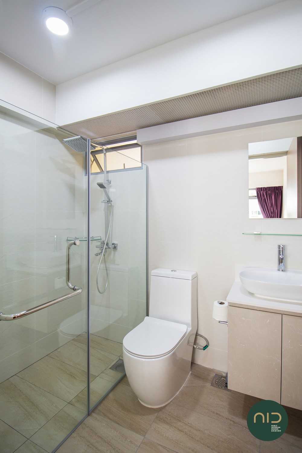Modern Bathroom with Homogeneous Tiles and Mirror