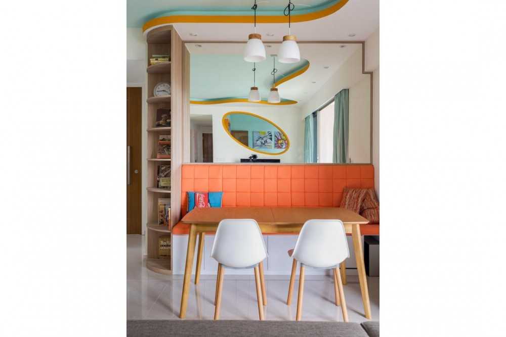 Eclectic Dining Room with Drop Light and Mirror