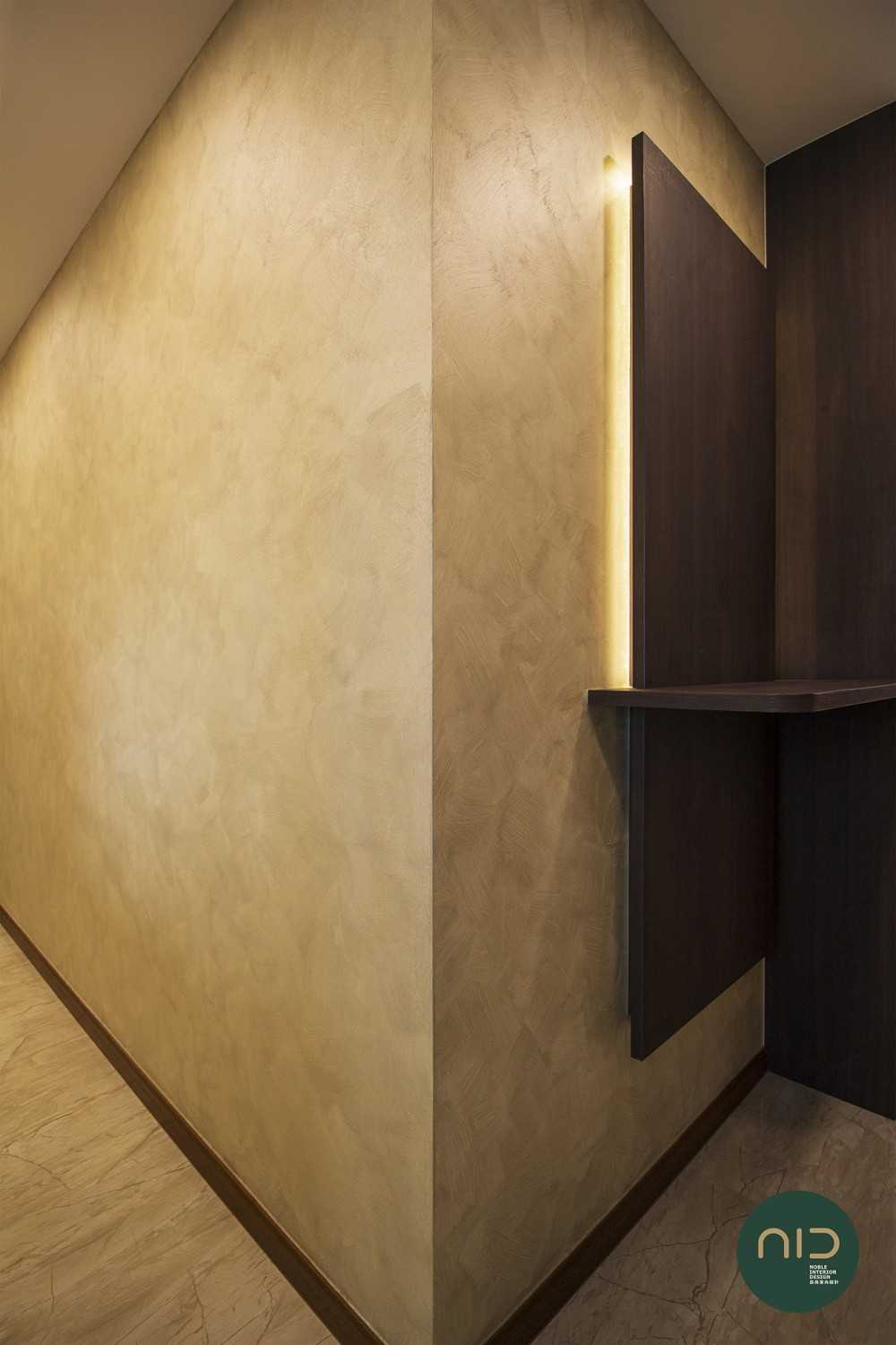 Modern Foyer with Feature Wall and Cove Lighting