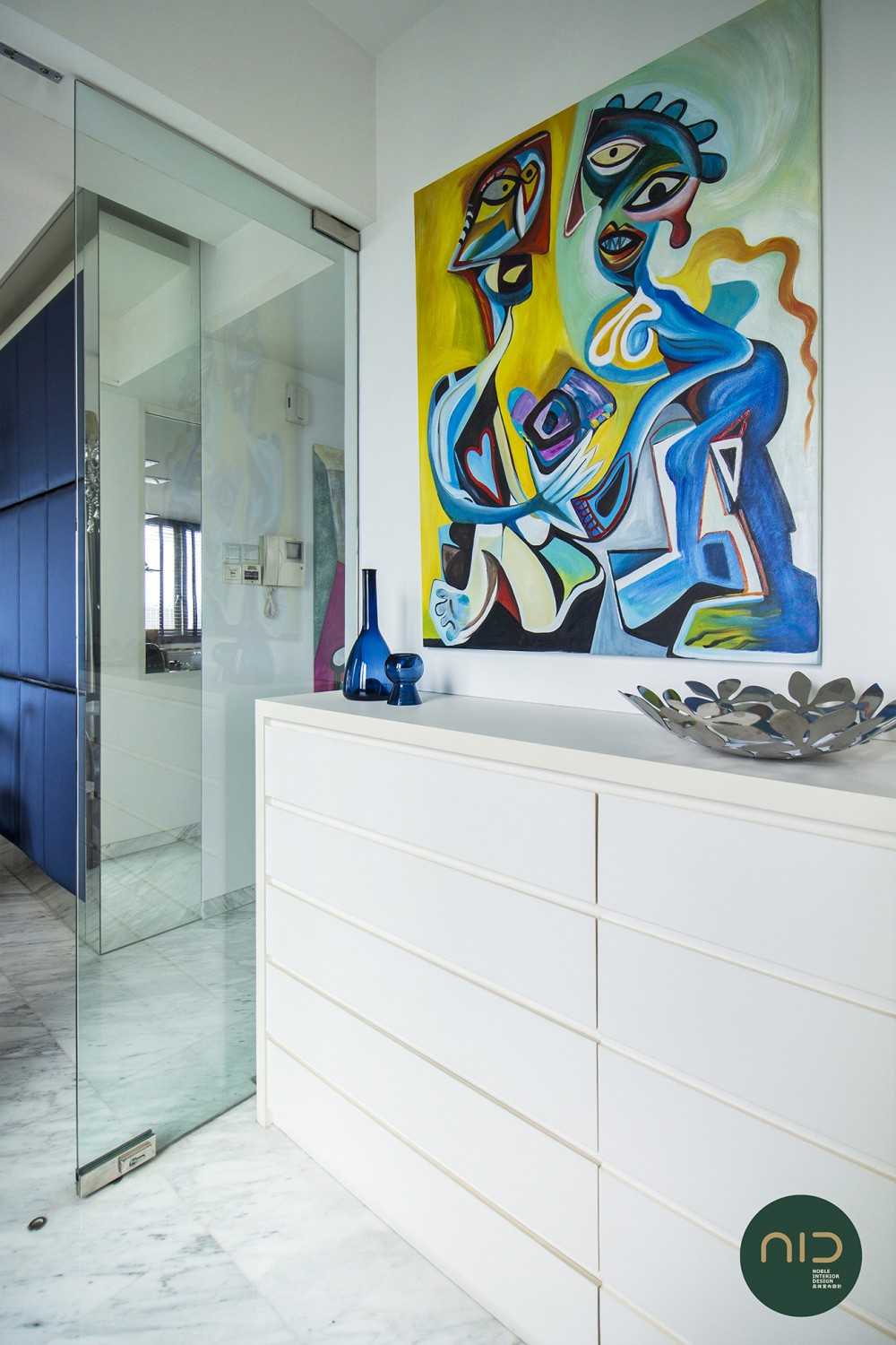 Modern Foyer with Marble Floor and Artwork