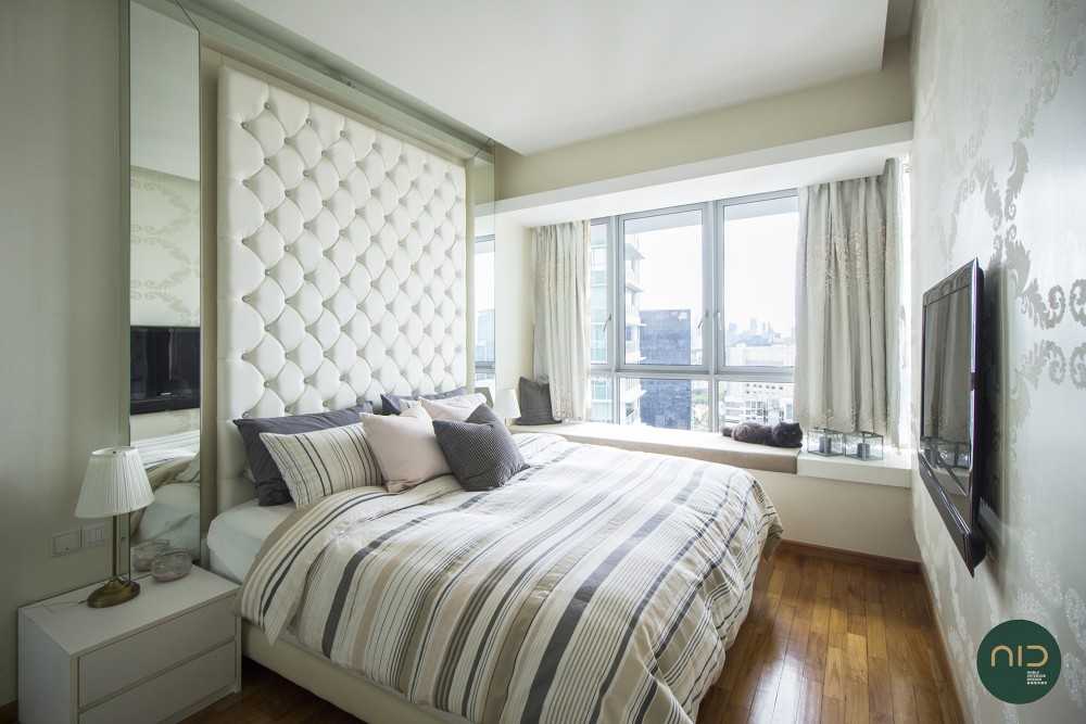 Modern Bedroom with Parquet Floor and Feature Wall