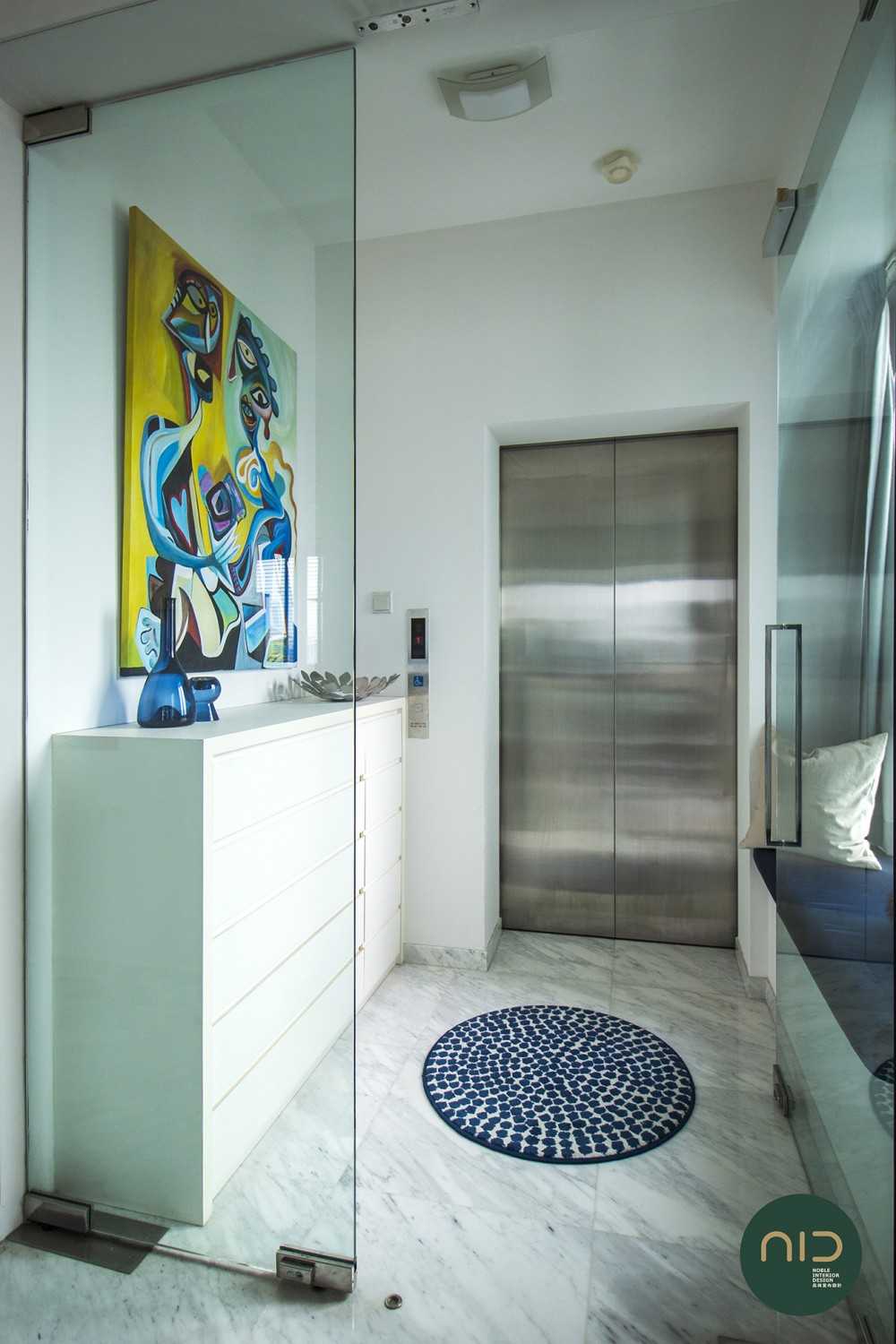 Modern Foyer with Bay Window and Glass Door