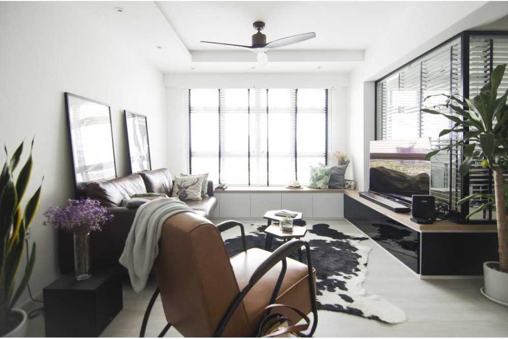 Eclectic Living Room with Sofa and Armchairs