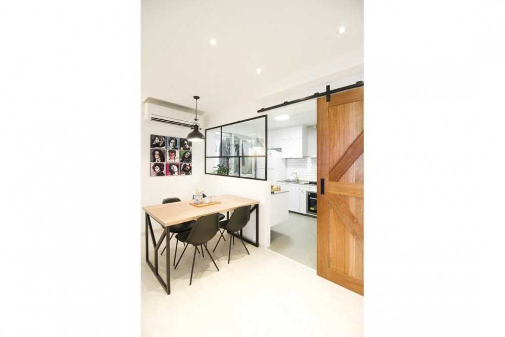 Eclectic Dining Room with Artwork and Dining Table