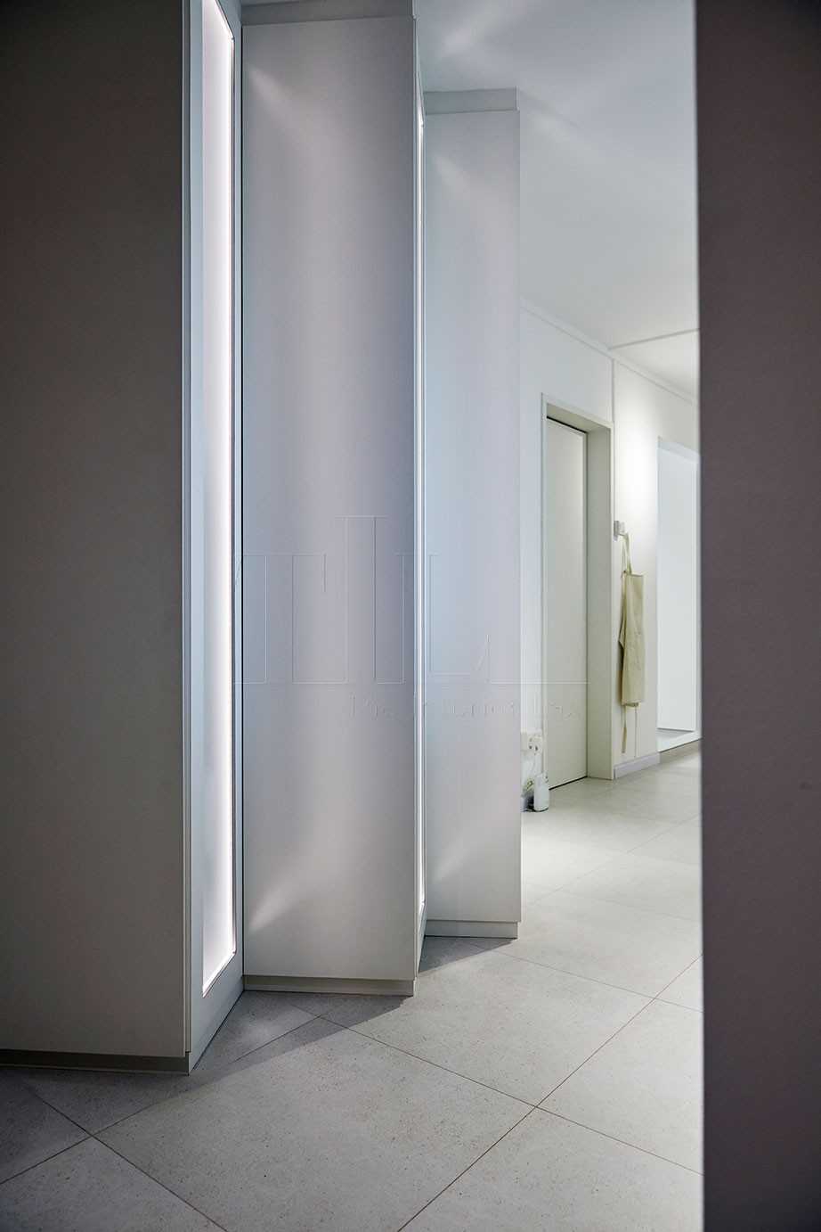 Scandinavian Hallway with Feature Wall and Cove Lighting