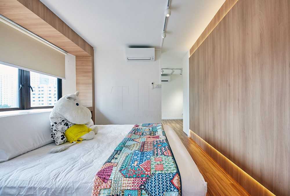 Scandinavian Bedroom with Wood Flooring and Feature Wall