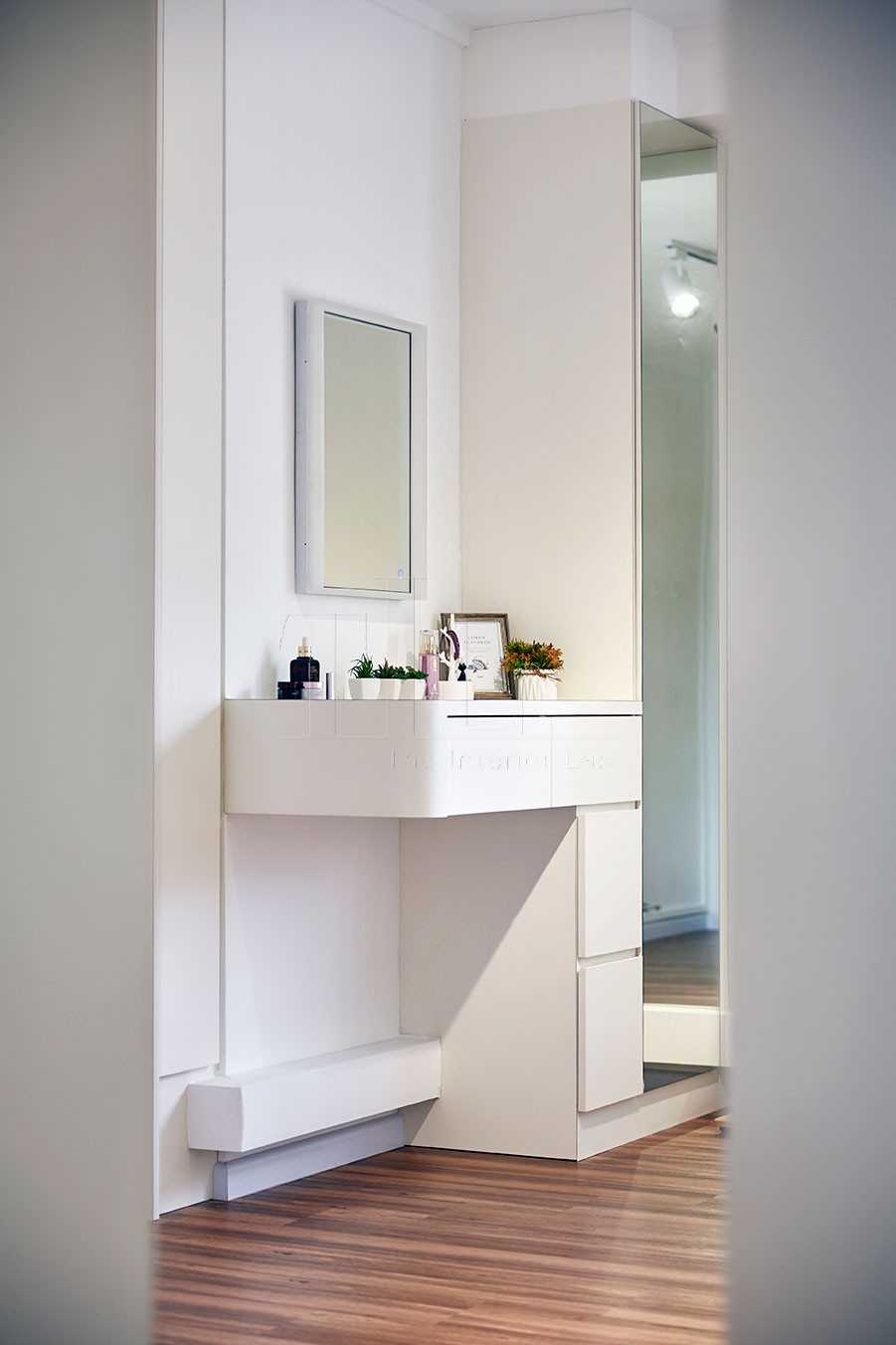Scandinavian Walk-in Wardrobe with Wood Flooring and Feature Wall