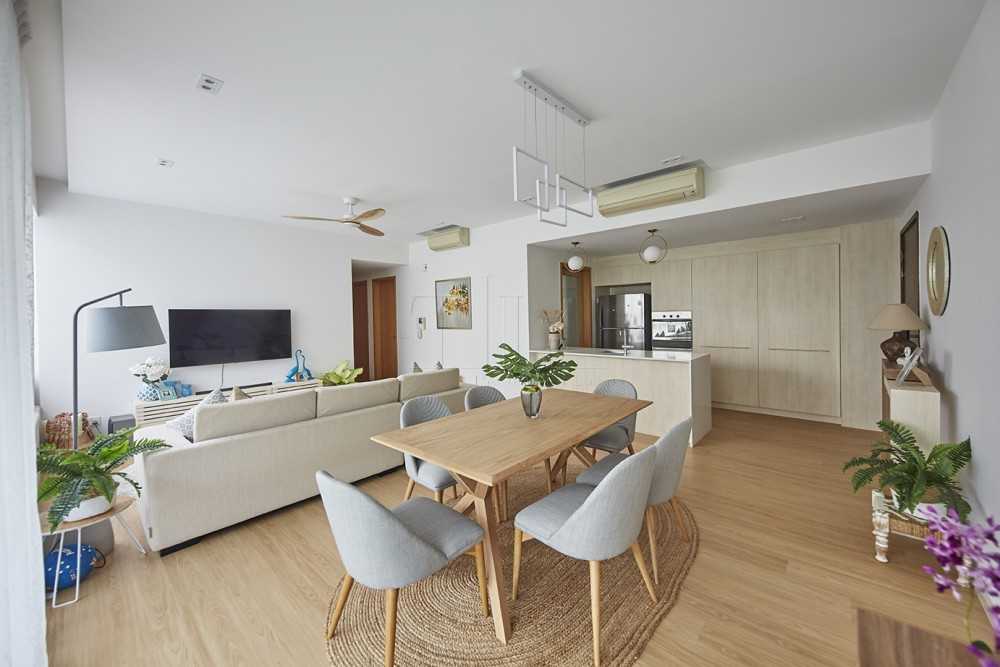 Minimalist Dining Room with Wood Flooring and Drop Light