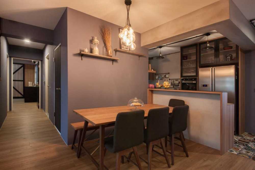 Eclectic Dining Room with Drop Light and Dining Table