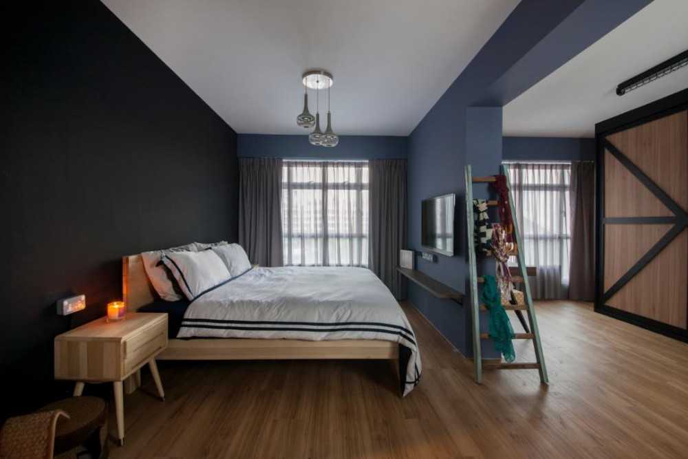 Eclectic Bedroom with Wood Flooring and Bedside Table
