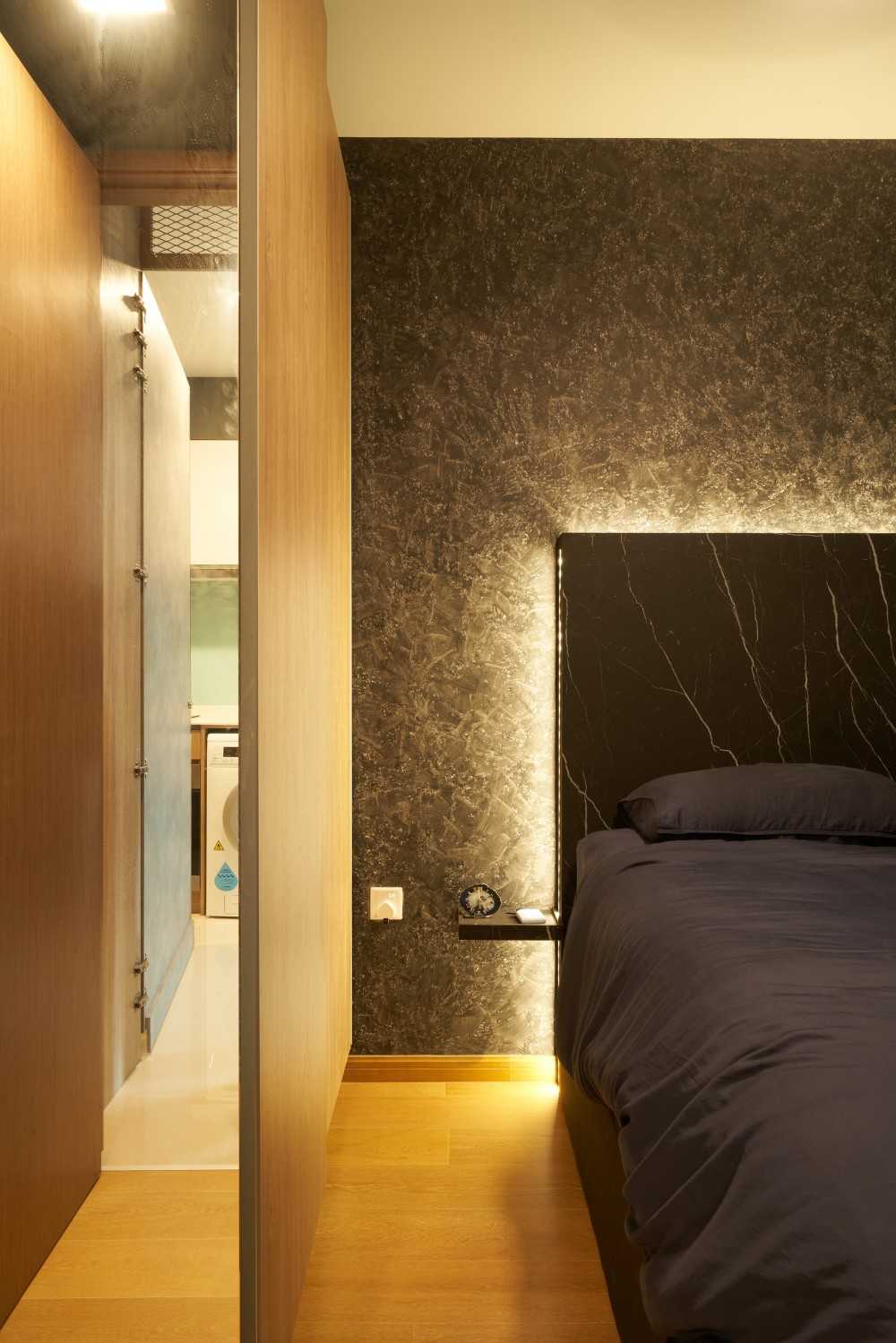 Modern Bedroom with Cove Lighting and Built-in Bed