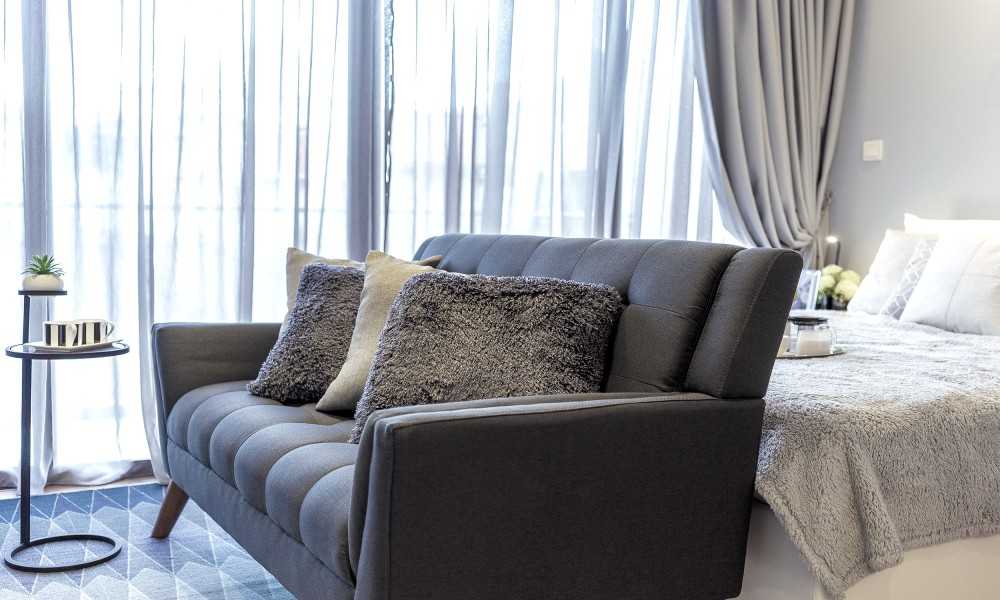 Transitional Bedroom with Ceiling Light and Sofa
